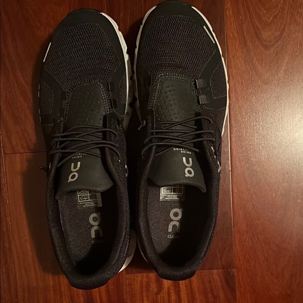 On Running Black Athletic Shoes with Sleek Design
